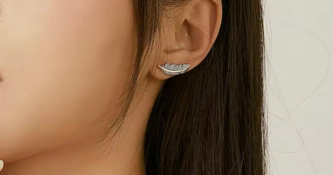 Silver feather earrings