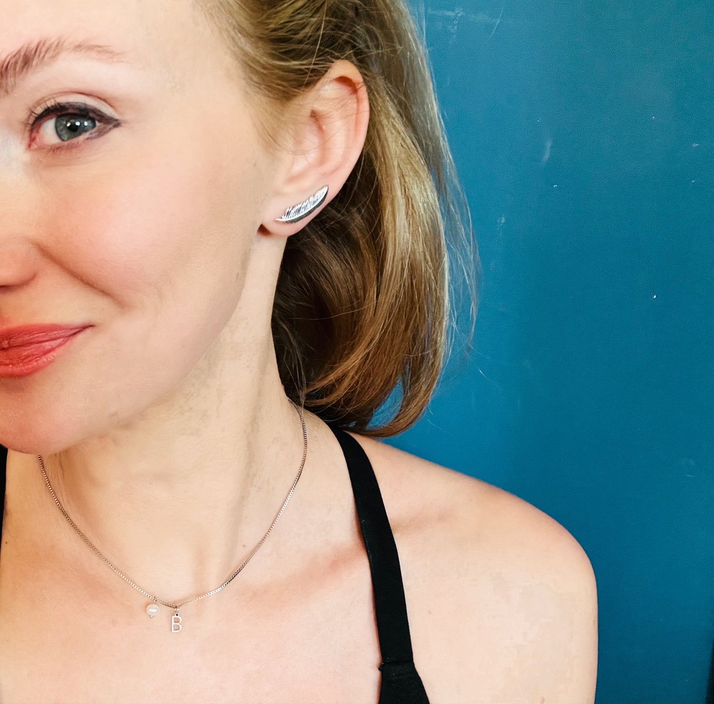 Silver feather earrings