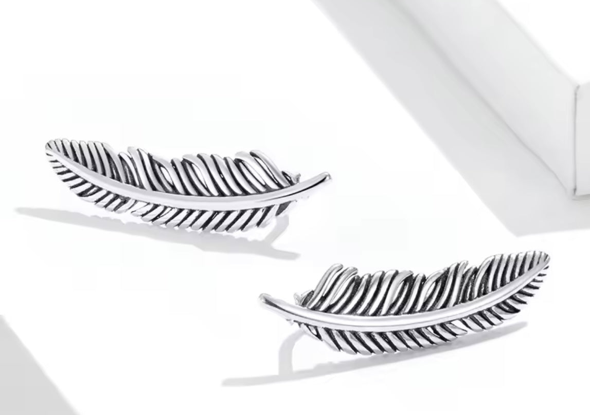 Silver feather earrings