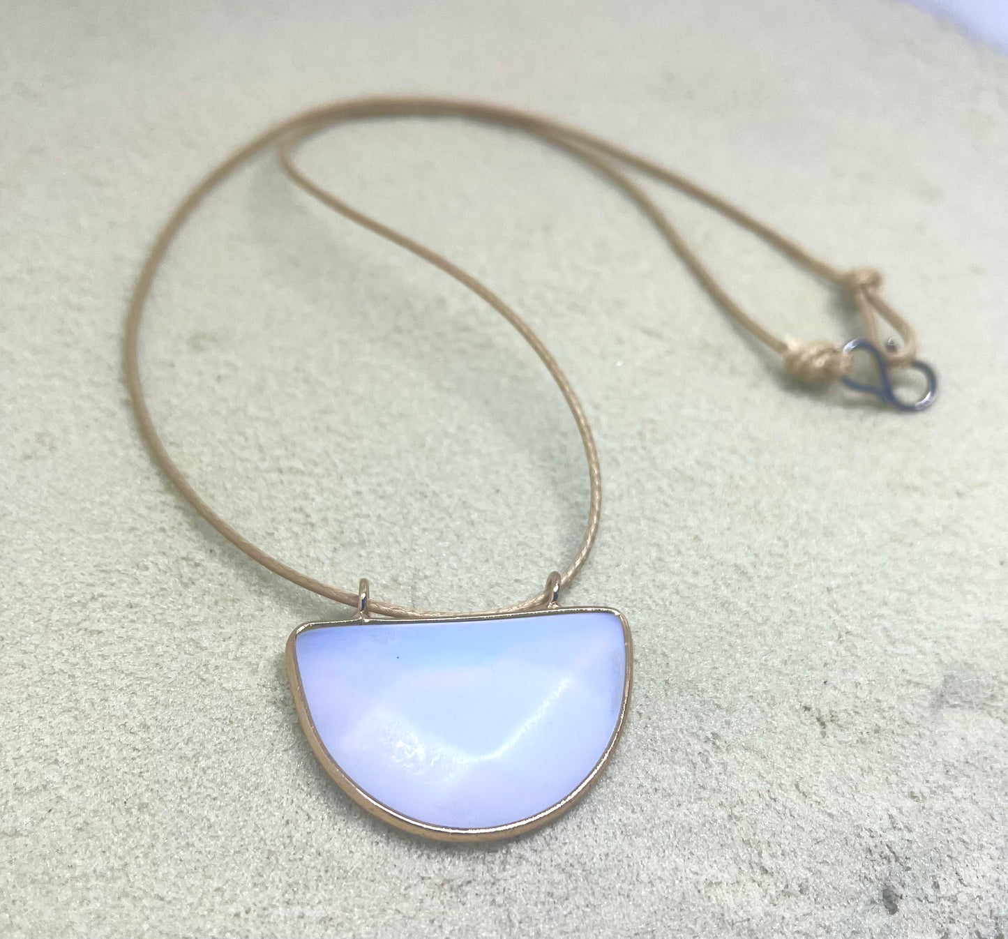 Opal pendant on cord